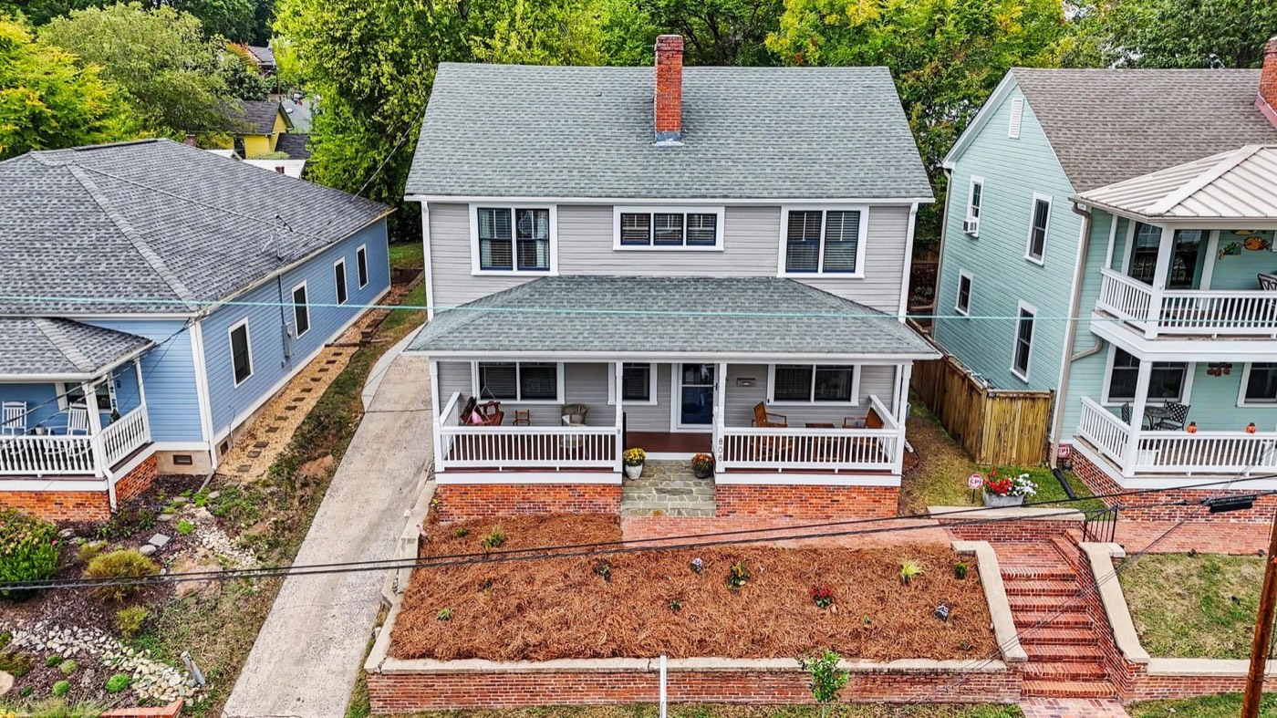 Aerial view of the house, deep lot and long driveway