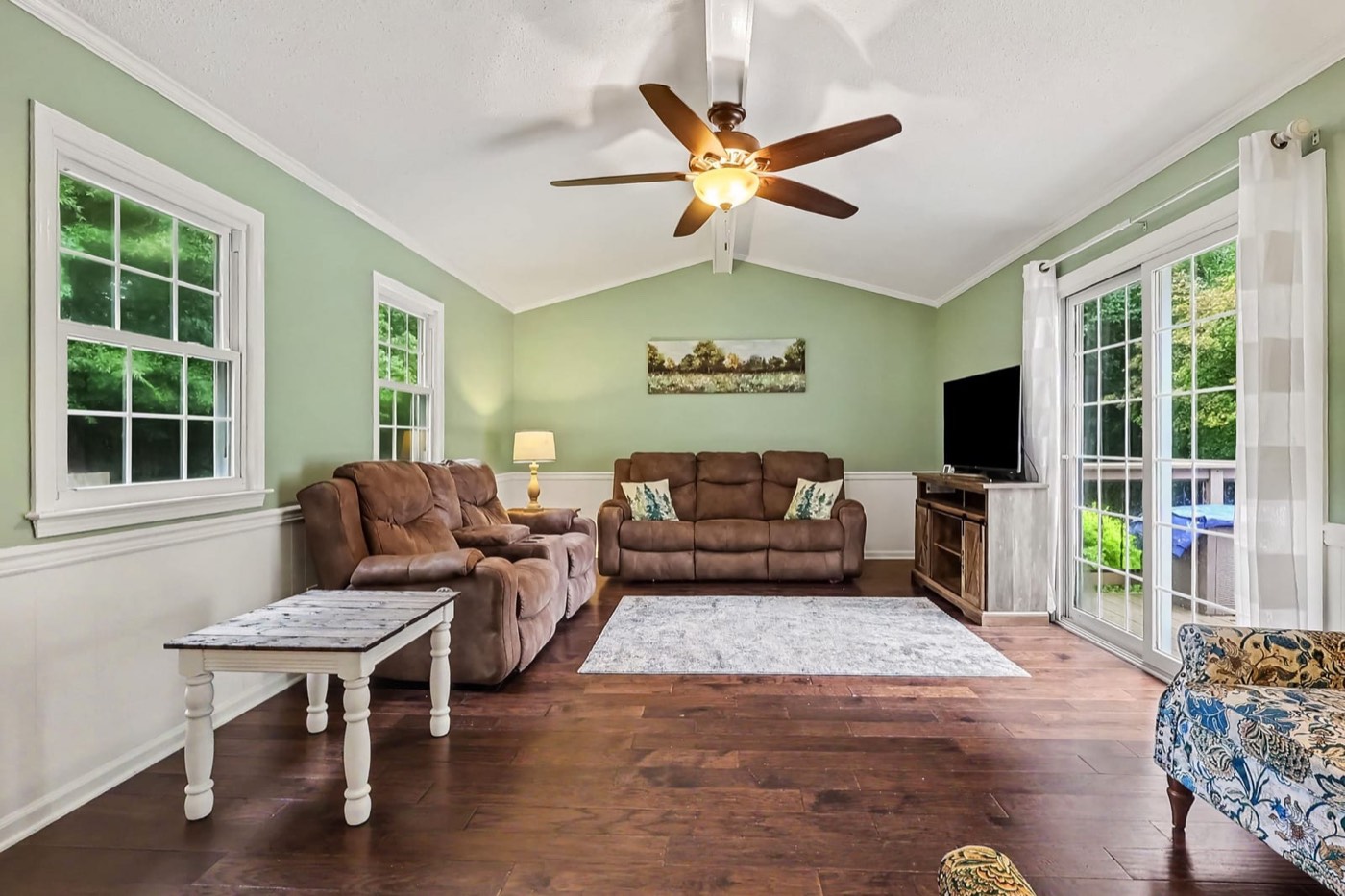 Living room with sliding doors to the deck