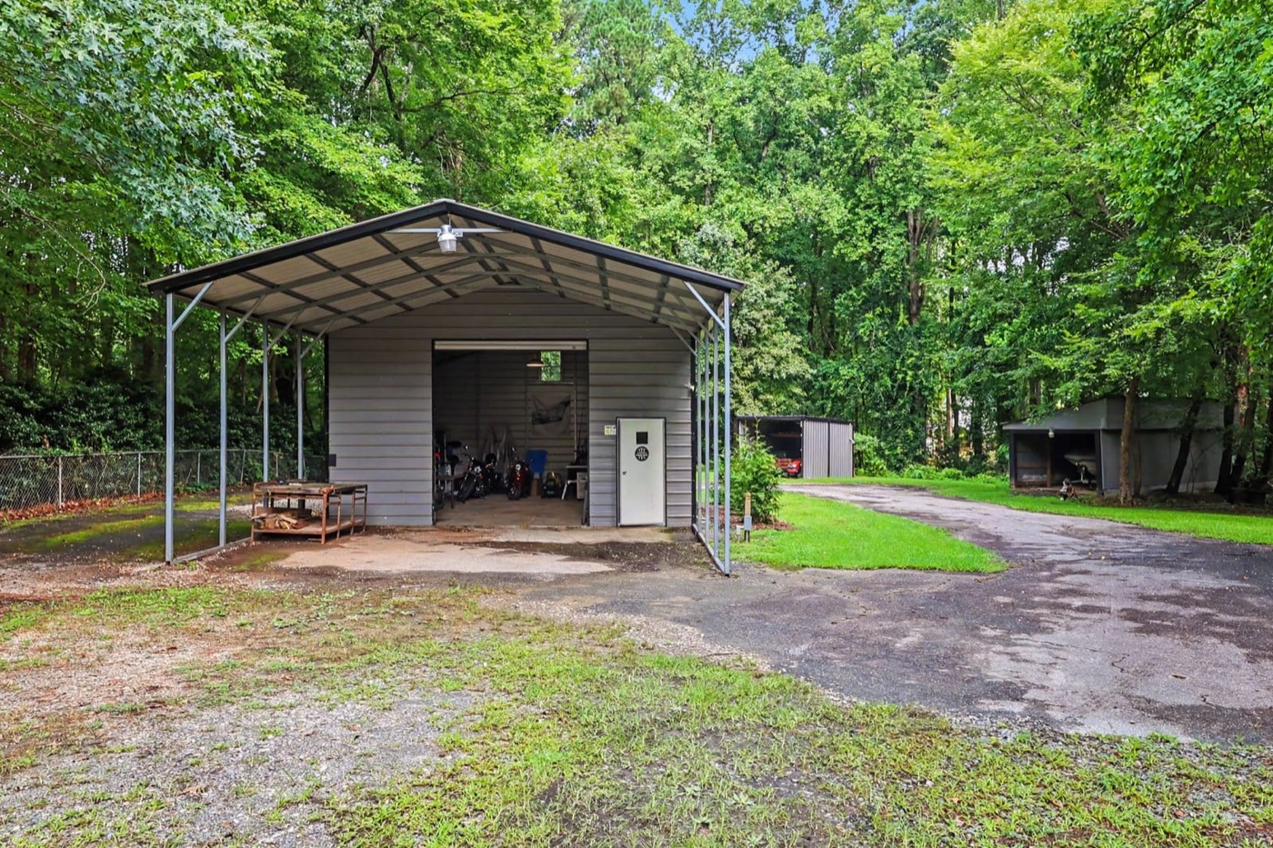 Detached shop with attached carport